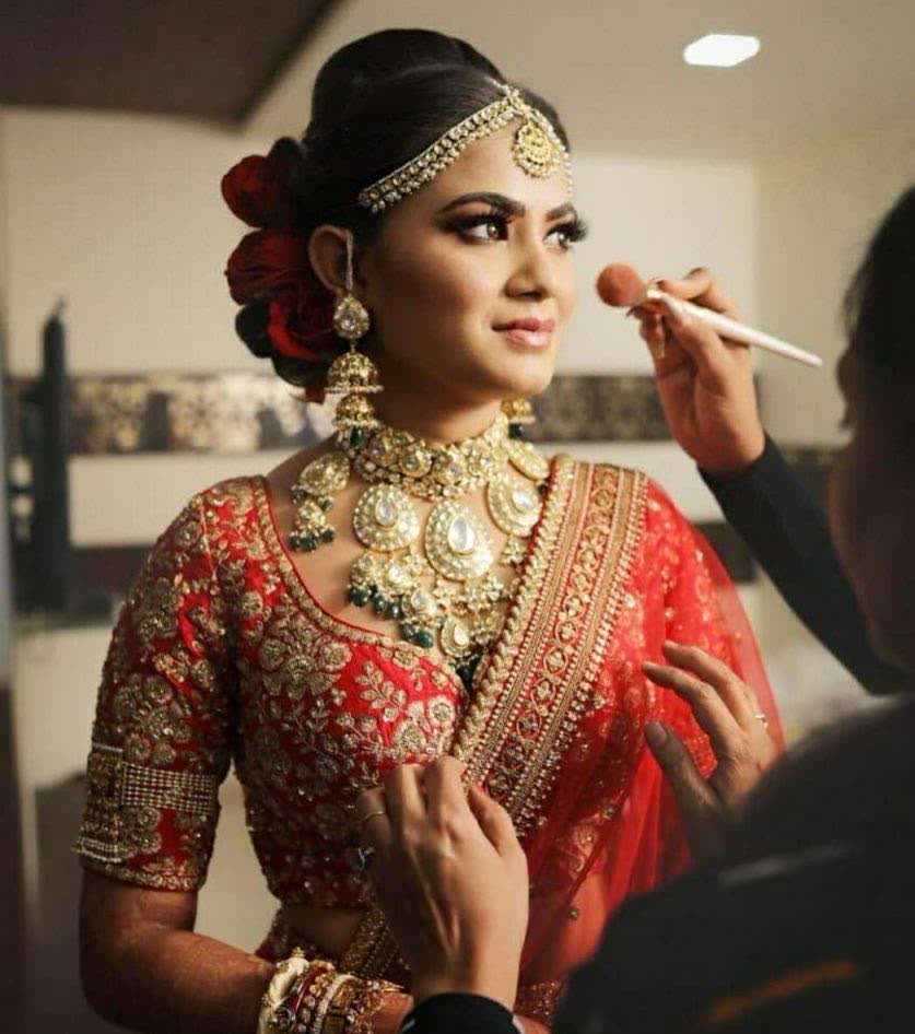 Vanshika applying bridal makeup